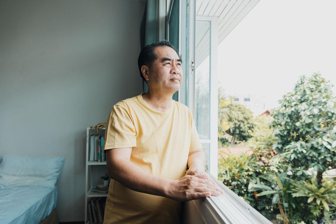 Man looking out of the window